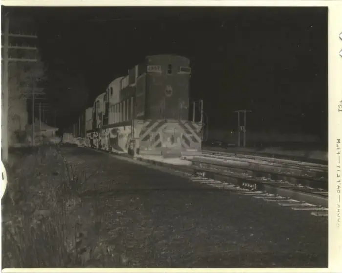 4" x 5" b&w negative, CPR 8557 and train at Locust Hill, Ontario